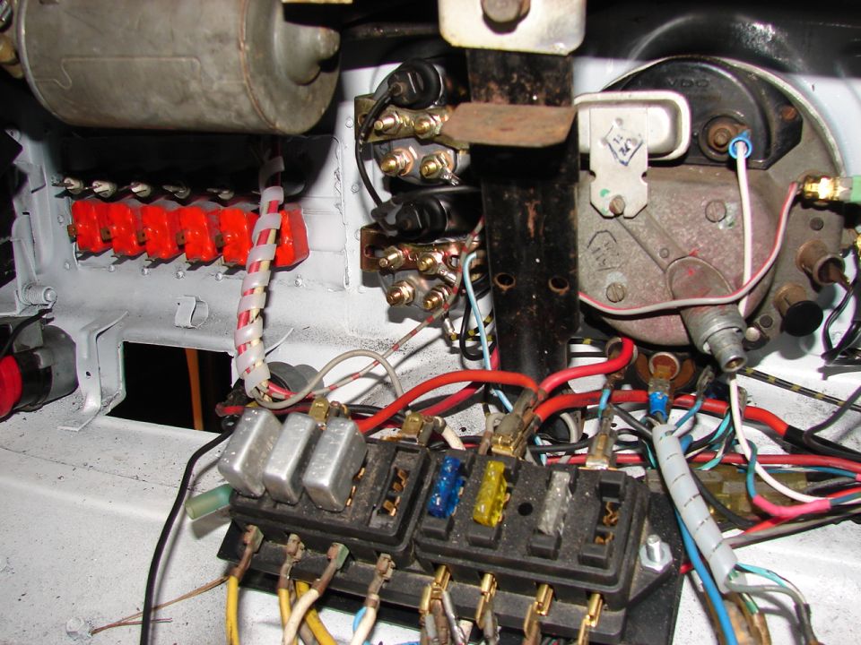 Vintage Volkswagen Beetle electrical wiring, fuse box, and relays.