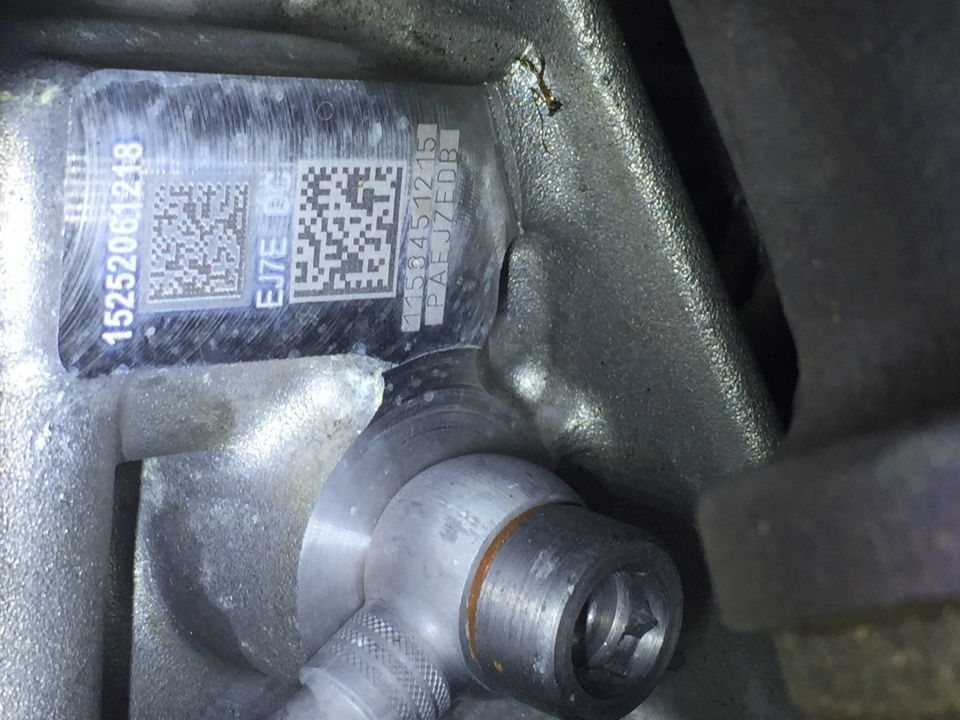 Vehicle part with serial numbers and QR codes: 15252061218, EJ7E-DC, 1153451215 PAEJ7EDB