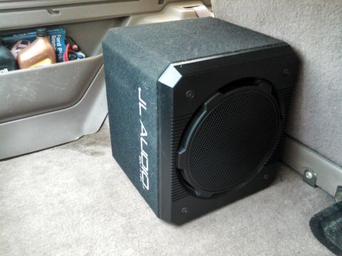1995 Ford Bronco - JL Audio 12W6 in a small sealed JL Audio box.
