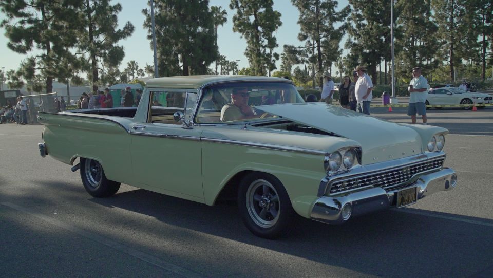 1959 Ford Ranchero with hood open, two-tone paint, chrome grille and bumpers