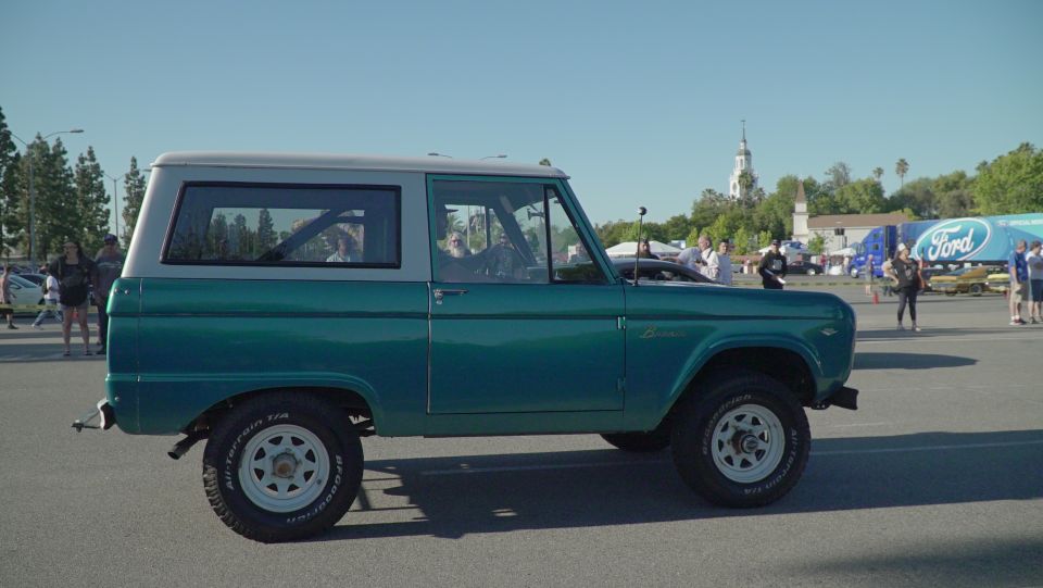 Teal and gray 1970s Ford Bronco side view