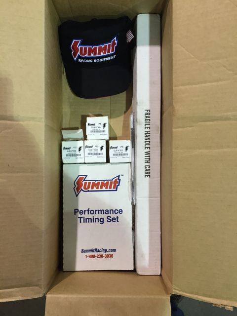 1978 Ford Bronco - A Summit Racing branded "Performance Timing Set" box is visible in the center of an open cardboard box, alongside several smaller Summit Ra…