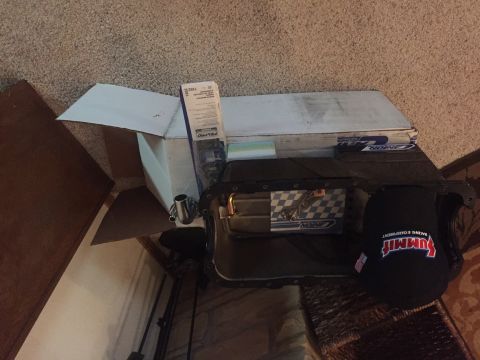 1982 Ford Bronco - A black Summit Racing Equipment hat is placed on top of a black oil pan. A box labeled FEL-PRO is visible in the background.
