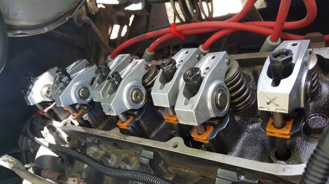 1978 Ford Bronco - A close-up view of the rocker arms and valve springs on a V8 engine, likely from a 1978 Ford Bronco. The engine appears to be undergoing ma…