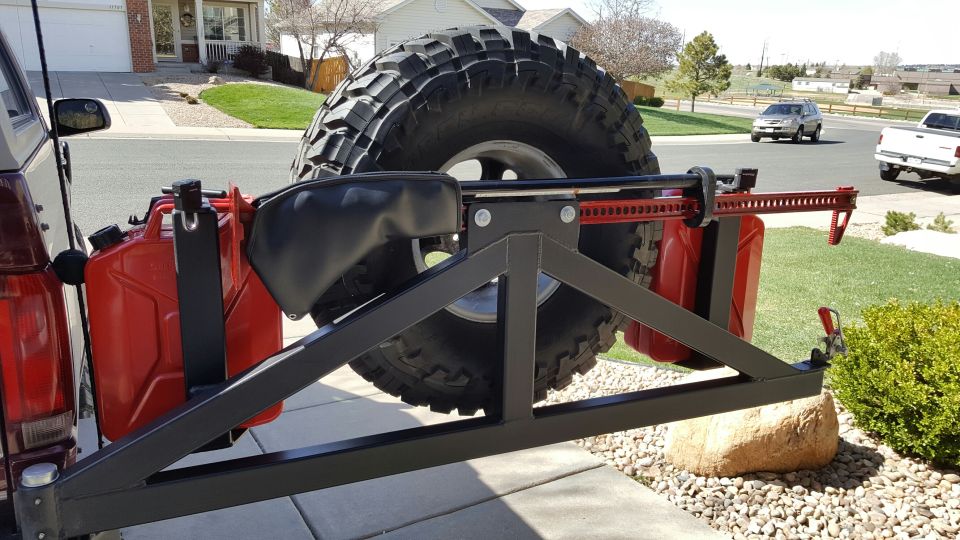 1996 Ford Bronco rear spare tire carrier with jerry cans and Hi-Lift jack