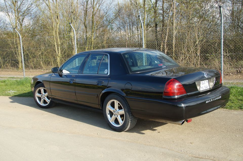 Black 2003 Mercury Marauder rear 3/4 view
