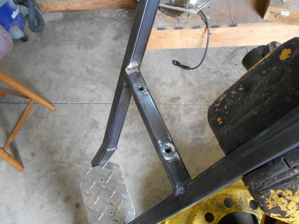 metal frame with diamond plate step, part of some equipment