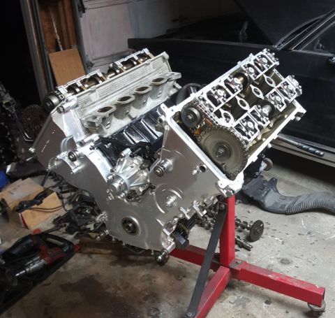 1985 Mercury Grand Marquis - Engine on stand, likely undergoing repair or rebuild.