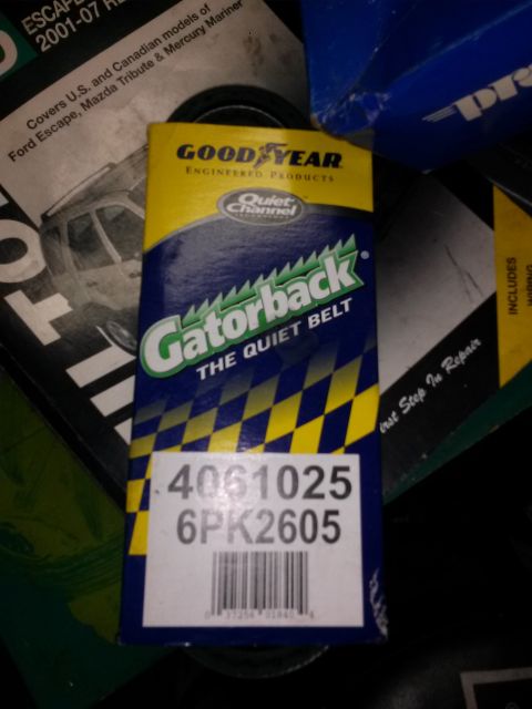 1996 Ford Bronco - A Goodyear Gatorback serpentine belt box is shown, featuring the text "THE QUIET BELT" and part numbers "4061025 6PK2605". The box is parti…
