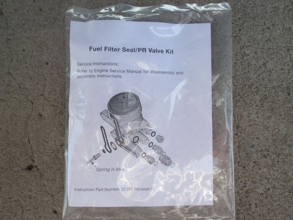 Fuel Filter Seal/PR Valve Kit in its bag with an exploded diagram of the filter housing