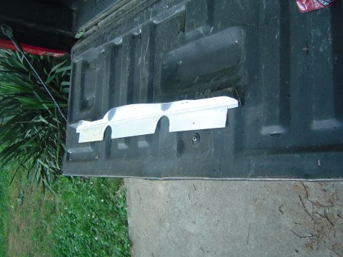 1986 Ford Bronco - I cut out and shaped this simple gap filler from a piece of scrap sheet metal. (Painted with aluminum paint)