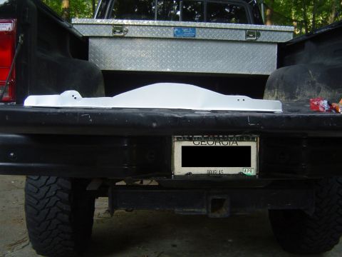1986 Ford Bronco - I cut out and shaped this simple gap filler from a piece of scrap sheet metal. (Painted with aluminum paint)