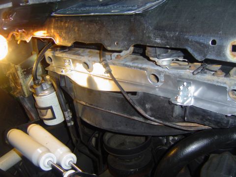 1986 Ford Bronco - Gap filler in place. It attaches to the lower core support with six sheet metal screws and to the fan shroud with two 1/4" bolts with…