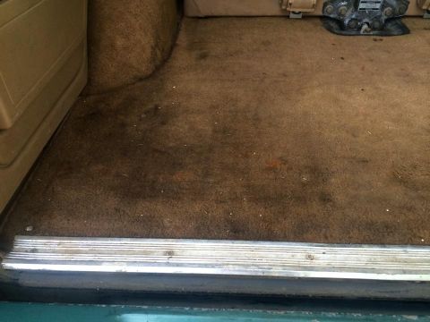 1990 Ford Bronco - Water under all this carpet when it rains....
