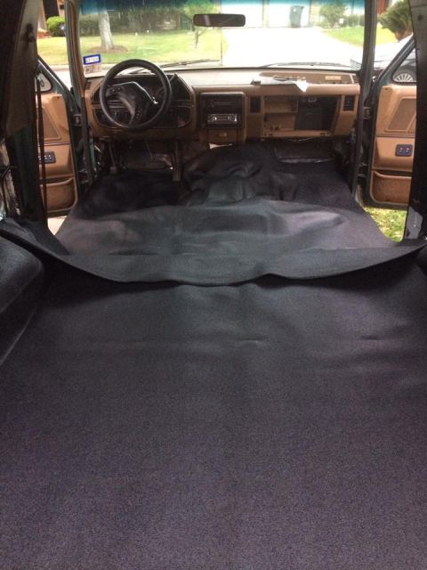 1990 Ford Bronco - Installing new carpet in the interior of a 1990 Ford Bronco.