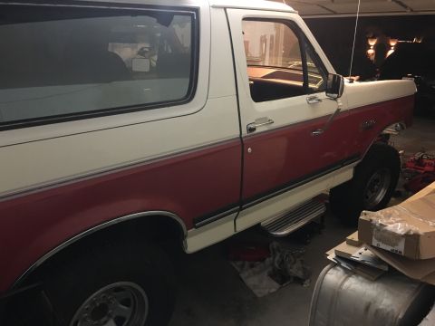 1987 Ford Bronco - This 1987 Ford Bronco is shown in a side profile, a two-tone red and white paint scheme.
