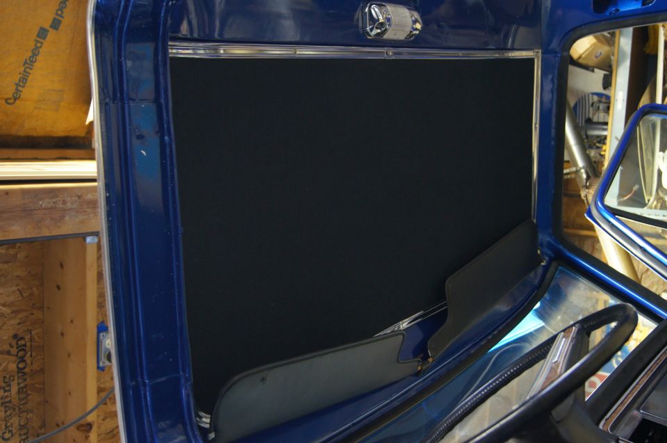 Kind of an awkward shot of the refurbished headliner. Nicole & Lynda recovered it in a black material that goes great with the seats.