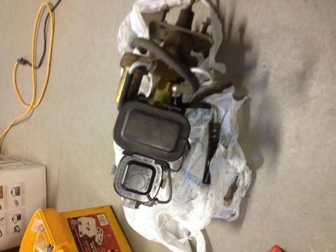 1973 Ford Bronco - Brake fluid reservoir and master cylinder assembly, likely for a vehicle.