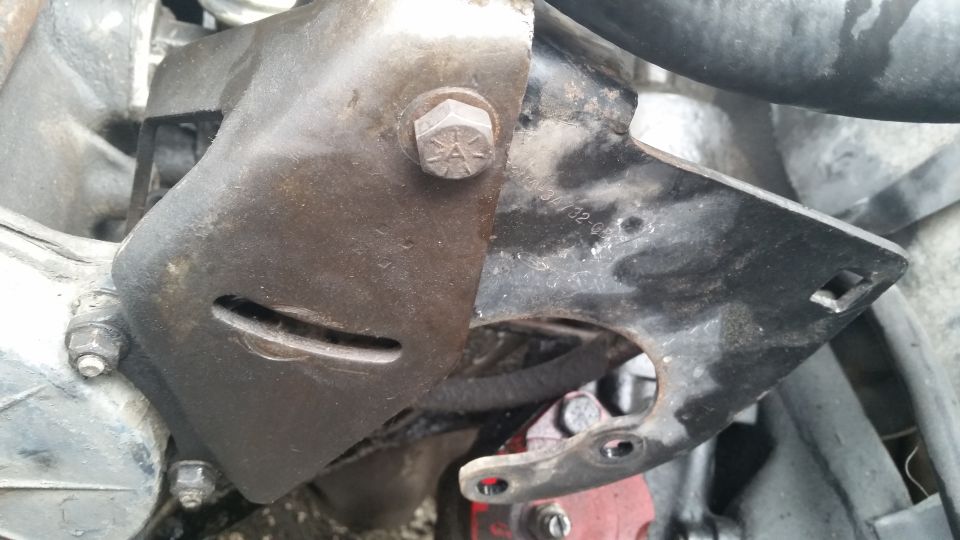 Engine bracket with visible part number