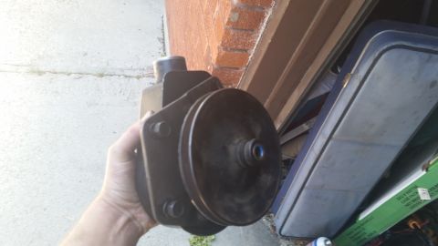 1981 Ford Bronco - A power steering pump is shown, likely for a vehicle restoration project.