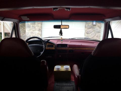 1995 Ford Bronco - Interior view of a 1995 Ford Bronco, highlighting the dashboard and seating.