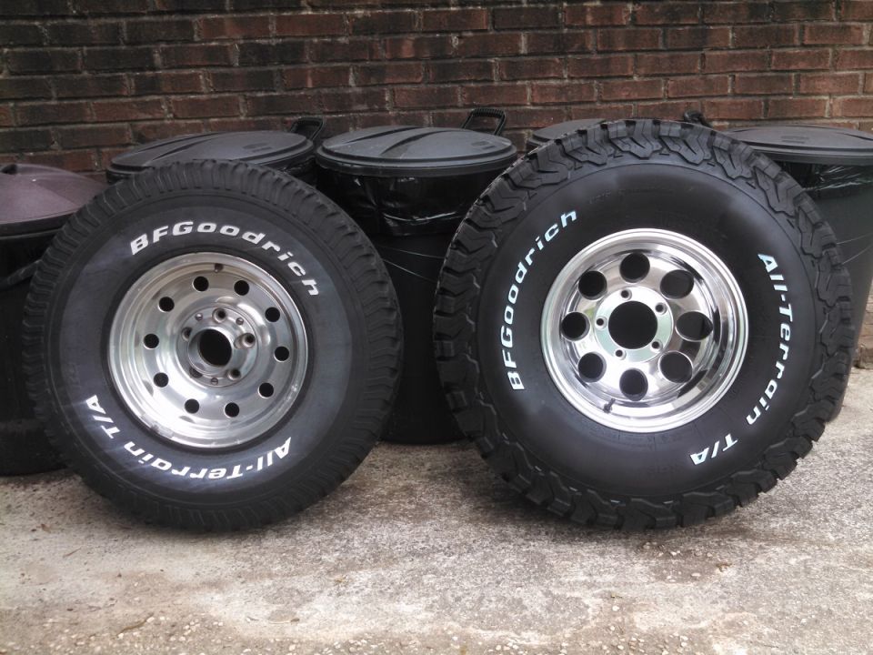 Two BFGoodrich All-Terrain T/A tires on chrome wheels