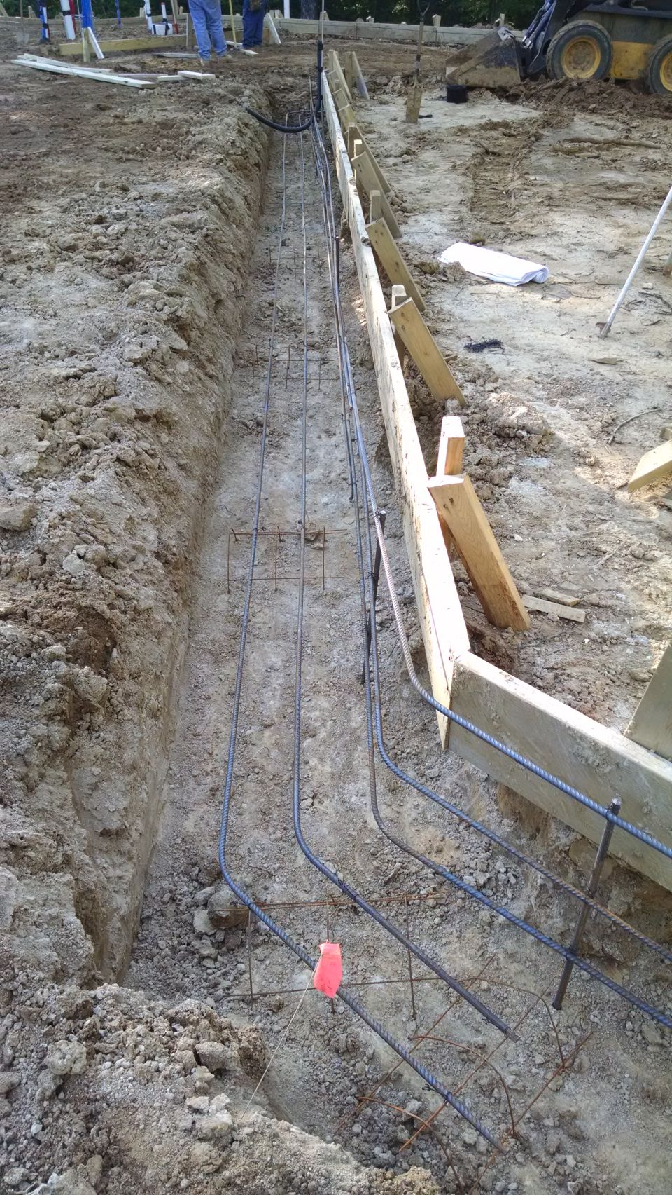Floor electrical, reinforcing steel, & termite pretreat went down May 5.