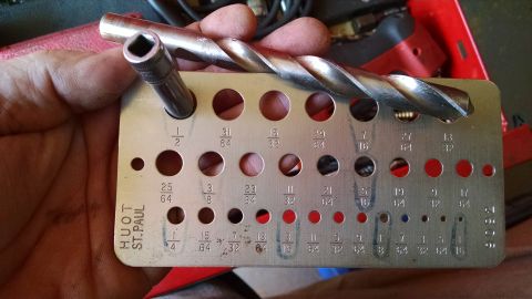 1983 Ford Bronco - The bolts are 5/16" (8mm), and a deep socket that size is slightly under 1/2" OD, so use a 1/2" bit to drill the door skin.…