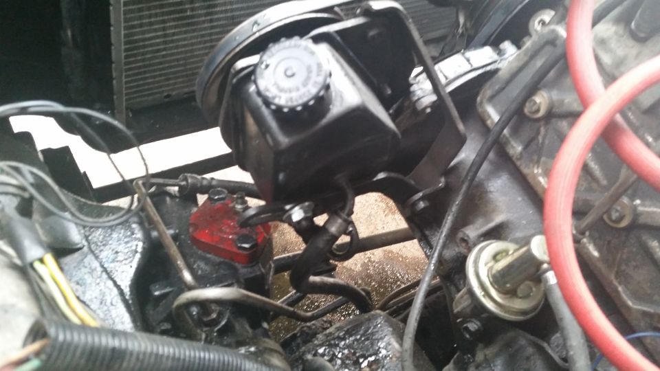 Engine bay power steering pump and hoses