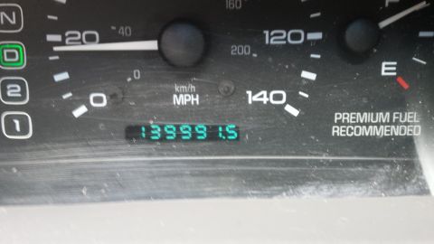1998 Lincoln Mark VIII - Odometer reading of 139,991.5 miles on a car's dashboard.