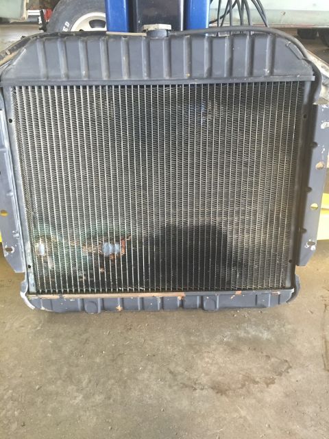 1978 Ford Bronco - This is a radiator, likely from an older vehicle, showing signs of wear and damage to its fins.