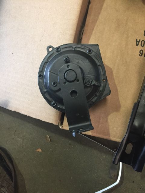 1978 Ford Bronco - A black car horn with its mounting bracket is shown, likely a replacement part.