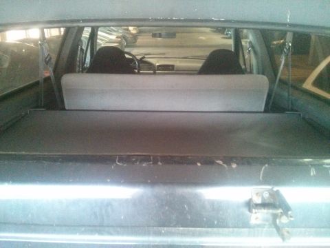 1995 Ford Bronco - View of the interior cargo area and dashboard of a 1995 Ford Bronco.