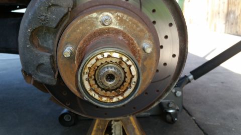1992 Ford Bronco - Front wheel hub assembly and brake rotor shown in detail, likely for a truck or SUV.