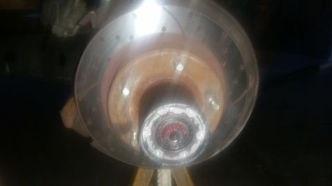 1992 Ford Bronco - This image shows a close-up view of a vehicle's front wheel hub and brake rotor assembly.