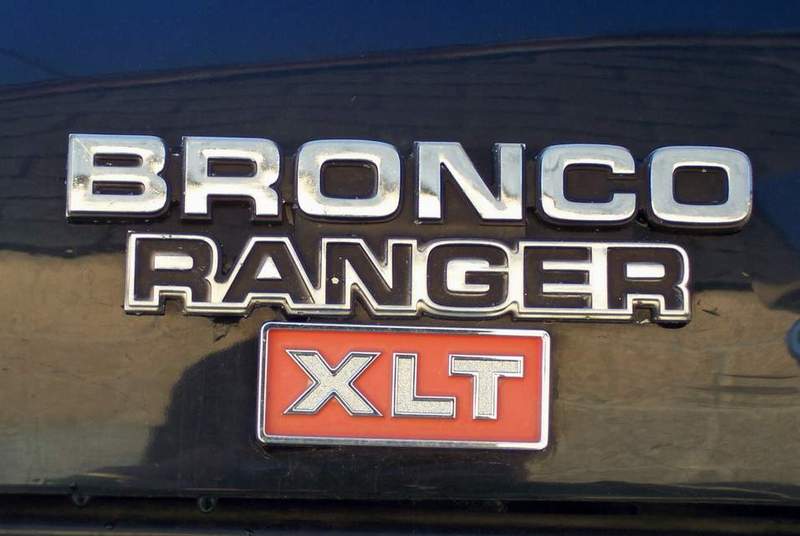 Bronco Ranger XLT emblem on dark background