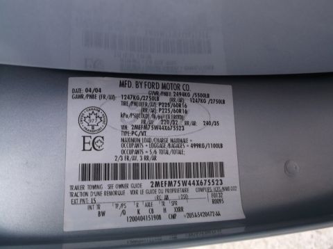 2005 Ford F-150 - Vehicle identification plate shows manufacturing date of April 2004 and VIN 2MEFM75W44X675523.