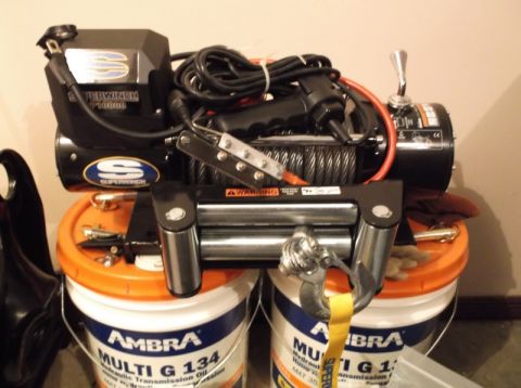 2005 Ford F-150 - A Superwinch 10000 winch is shown mounted on two orange buckets.