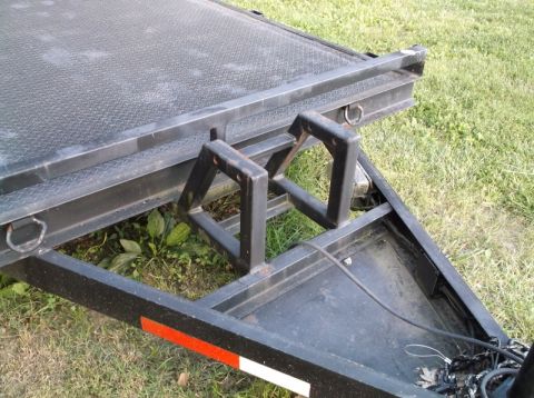 2005 Ford F-150 - This photo shows the frame of a trailer, not a 2005 Ford F-150. The trailer has a diamond plate surface and tie-down points.
