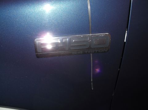 2005 Ford F-150 - F-150 5.4 Triton badge is visible on the vehicle's exterior.