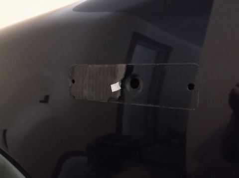 2005 Ford F-150 - Area where emblem was removed from a 2005 Ford F-150 fender.