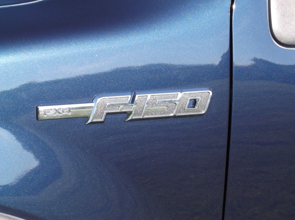 Blue Ford F-150 FX4 badge on side panel