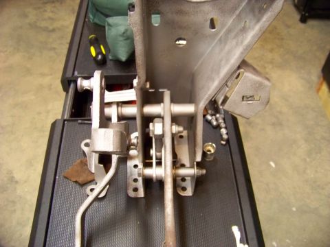 1974 Dodge Challenger - This image shows the mechanical components of a vehicle's pedal assembly, including the clutch and brake pedals and their associated linkag…