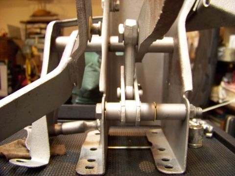 1974 Dodge Challenger - The intricate mechanical linkage of a vehicle's pedal assembly is shown in this detailed view.