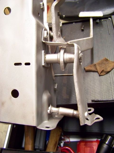 1974 Dodge Challenger - Close-up of a vehicle's pedal assembly, showing mechanical components and pivot points.
