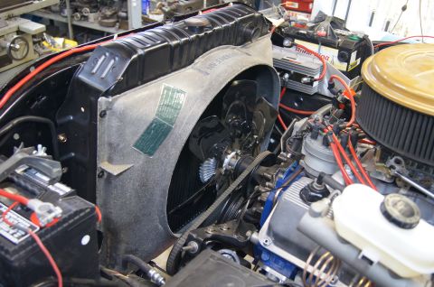 1979 Ford Bronco - Close-up of a vehicle's engine bay, focusing on the radiator and cooling fan assembly.