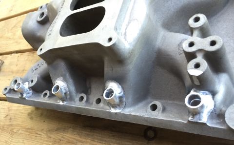 1981 Ford LTD - Driver's side bungs welded.