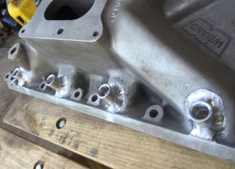 1981 Ford LTD - Passenger side bungs welded.