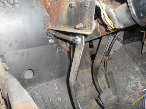 1972 Ford Bronco - Close-up of the interior pedal assembly, showing signs of wear and exposed wiring.