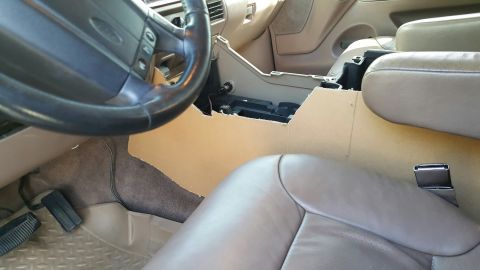 1996 Ford Bronco - Interior view of a 1996 Ford Bronco with the center console disassembled.